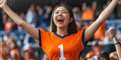 asian female fan cheering in stadium, blank bright orange football jersey, navy blue trim, white number "1" 