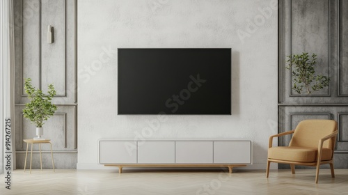 TV cabinet against a white plaster wall in a living room with a minimalist armchair design.
