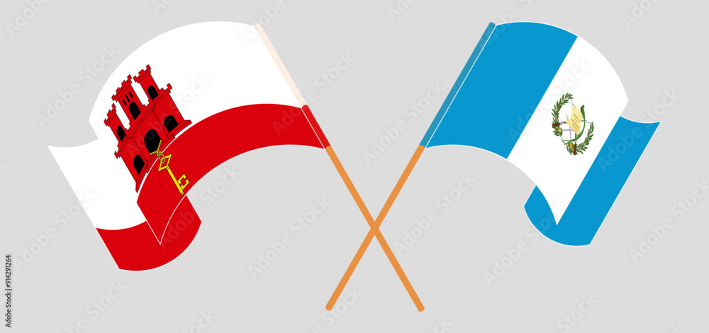 Crossed and waving flags of Gibraltar and Republic of Guatemala Crossed and waving flags of Gibraltar and Republic of Guatemala