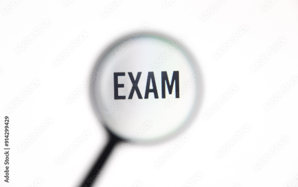 Word exam on screen through magnifying glass close-up Word exam on screen through magnifying glass close-up