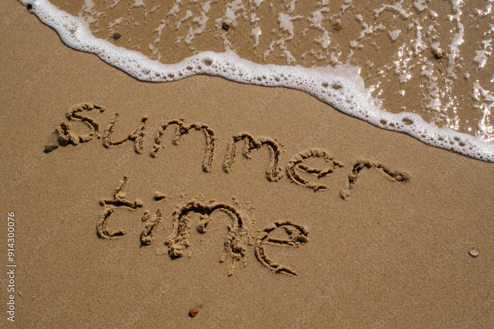 Fototapeta premium inscription on the sand of Summer Time