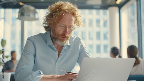 The man working laptop photo