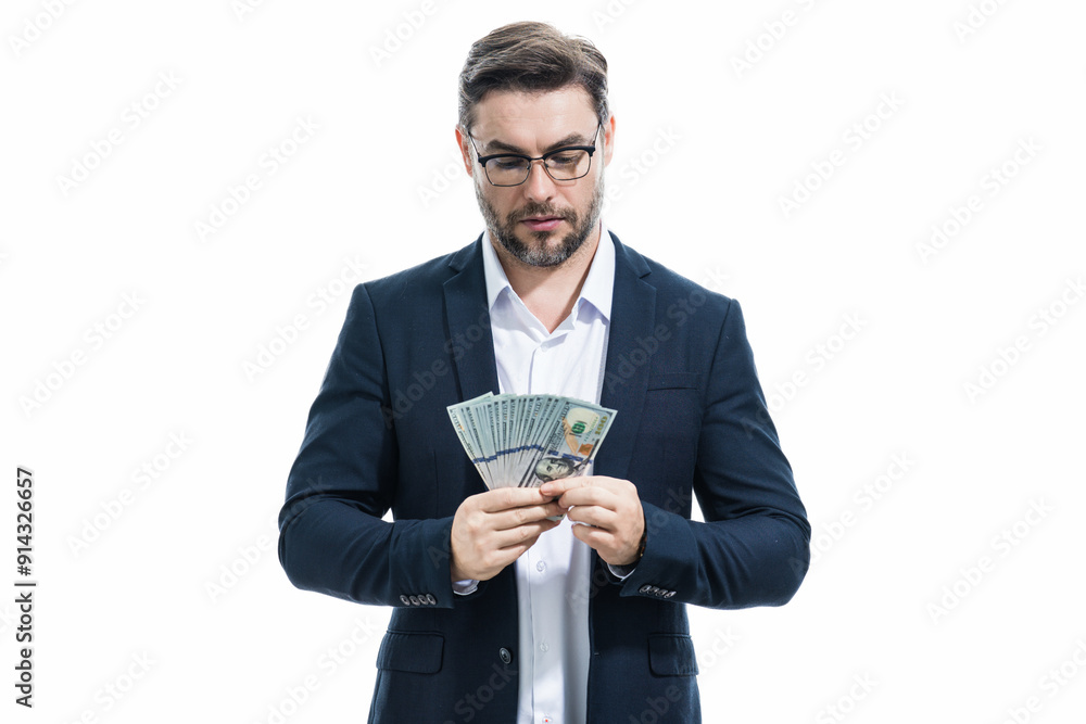 Business man hold money on white studio isolated background. Rich man in suit with money dollar bills. Successful businessman with dollar banknotes. Rich millionaire in suit holding money. Business man hold money on white studio isolated background. Rich man in suit with money dollar bills. Successful businessman with dollar banknotes. Rich millionaire in suit holding money.