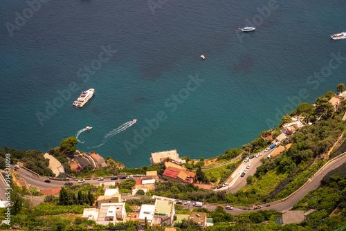 Scenic Coastal Road with Boats on Blue Seascape, drone aerial view from Terrace of Infinity, Gardens of Villa Cimbrone villa in ravello photo