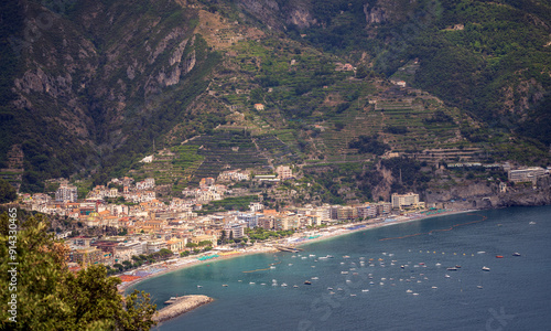 Scenic Coastal Town with Mountain Backdrop and Clear Blue Waters, Amalfi coast line aerial view, Drone shot, Italy, Europe