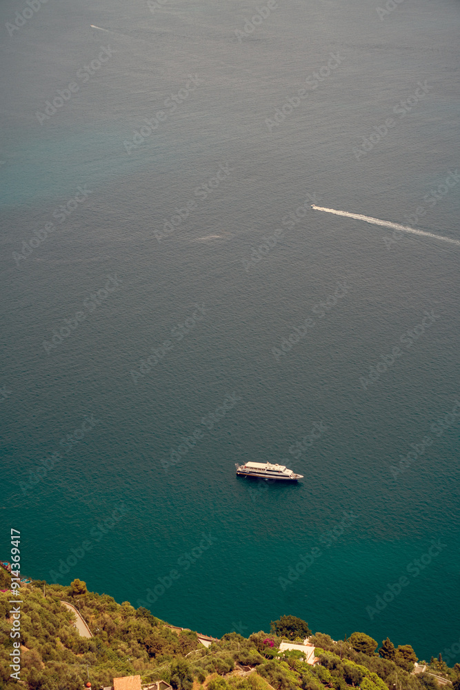 Luxury Yacht Cruising in Serene Blue Waters, aerial drone photography, Italy, Europe