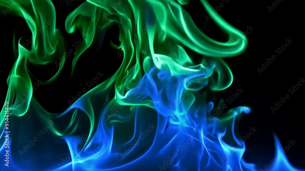 Blue and green flames dancing on a black background, creating an eerie and surreal effect. Blue and green flames dancing on a black background, creating an eerie and surreal effect.