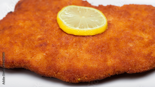 delicious traditional german schnitzel with lemon slice