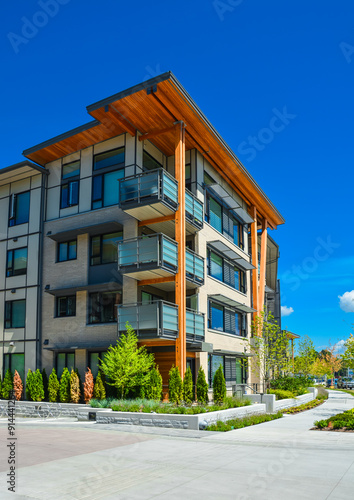 Brand new apartment building on sunny day in British Columbia, Canada.