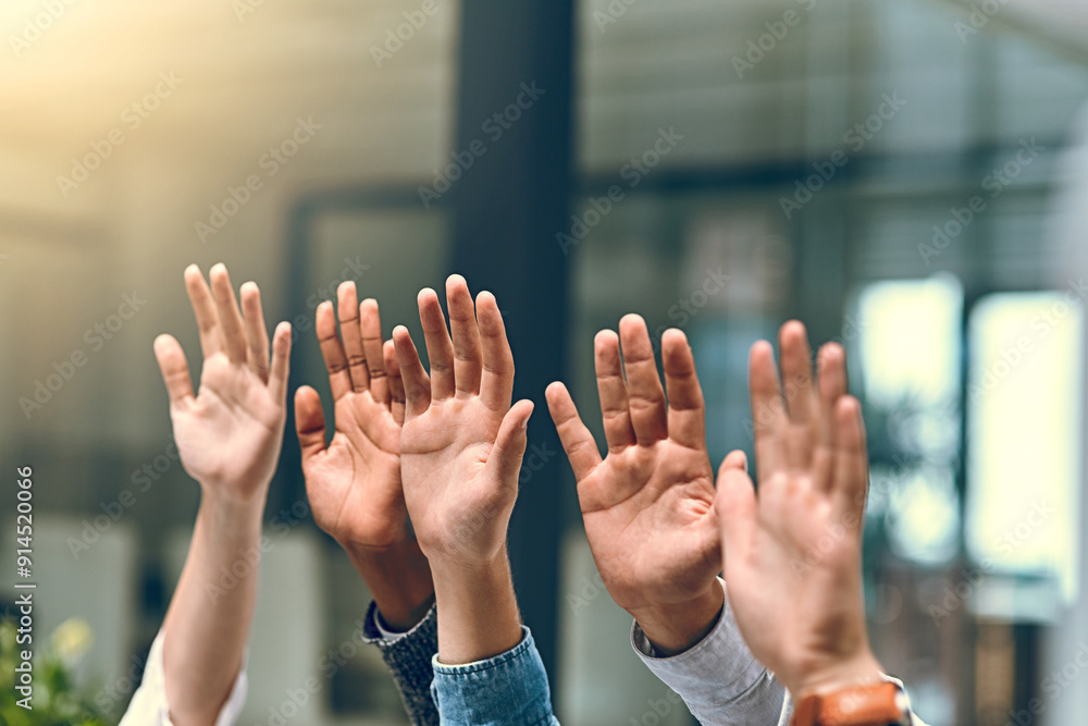 © JordaanExams/peopleimages.com - Group, hands raised and business people with question in office for volunteer, agreement or support. Audience, crowd and vote with staff at workshop for training, feedback or answer orientation query