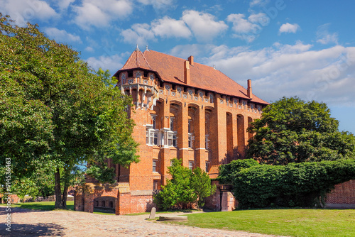 Malbork, Poland - the photo shows a fragment of the Teutonic Knights' castle, dedicated to the Blessed Virgin Mary. The castle was built in several stages from 1280 to the mid-15th century.