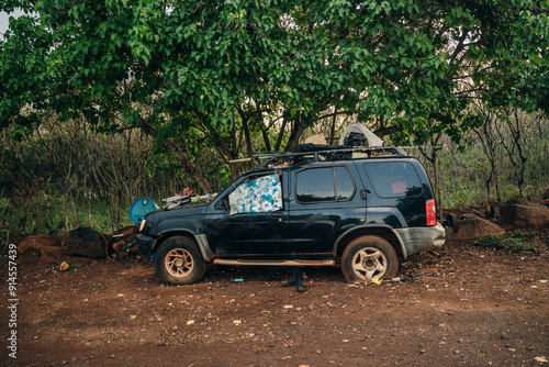 abandoned car on the beach in kauai, hawaii - dec 2th 2023