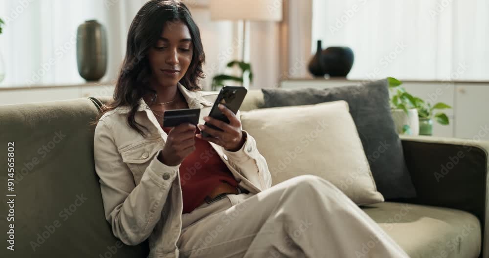 Woman, credit card and smartphone on home sofa, security details and mobile banking app for ecommerce. Customer, online shopping and living room with fintech, internet payment and website purchase Woman, credit card and smartphone on home sofa, security details and mobile banking app for ecommerce. Customer, online shopping and living room with fintech, internet payment and website purchase