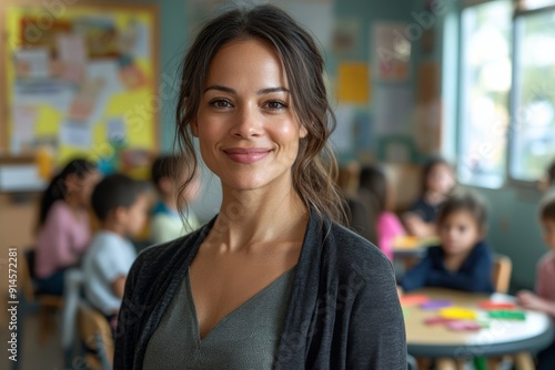 Portrait of smiling teacher in a class at school.