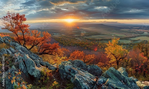 Sunset view from Grayobbled Rock in the shenandoah national park, overlooking valley with colorful trees and distant mountains