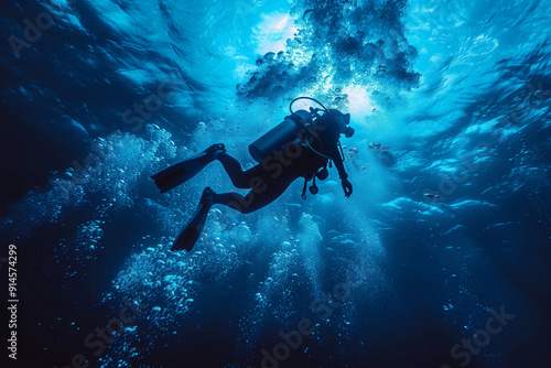 Exploring the Mysteries of the Deep Blue Sea: A Woman's Scuba Adventure at Dusk