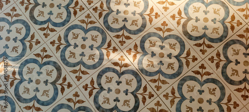 decorative blue and yellow Portuguese flooring, illuminated by the sun