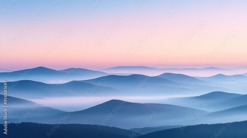 Serene Landscape of Foggy Mountain Range at Dawn with Soft Pastel Colors and Layered Peaks Serene Landscape of Foggy Mountain Range at Dawn with Soft Pastel Colors and Layered Peaks