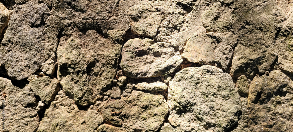 old stone wall with shadows and sunlight, rustic background old stone wall with shadows and sunlight, rustic background