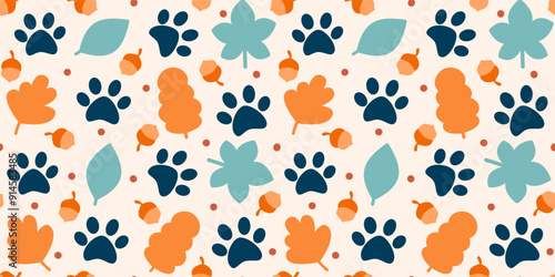 cute hand drawn seamless vector pattern illustration for fall autumn season with orange and blue leaves, acorn and paw prints on cream background