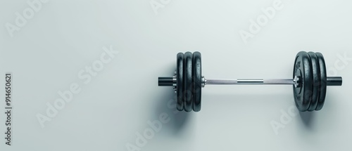 A black and silver dumbbell with a white background