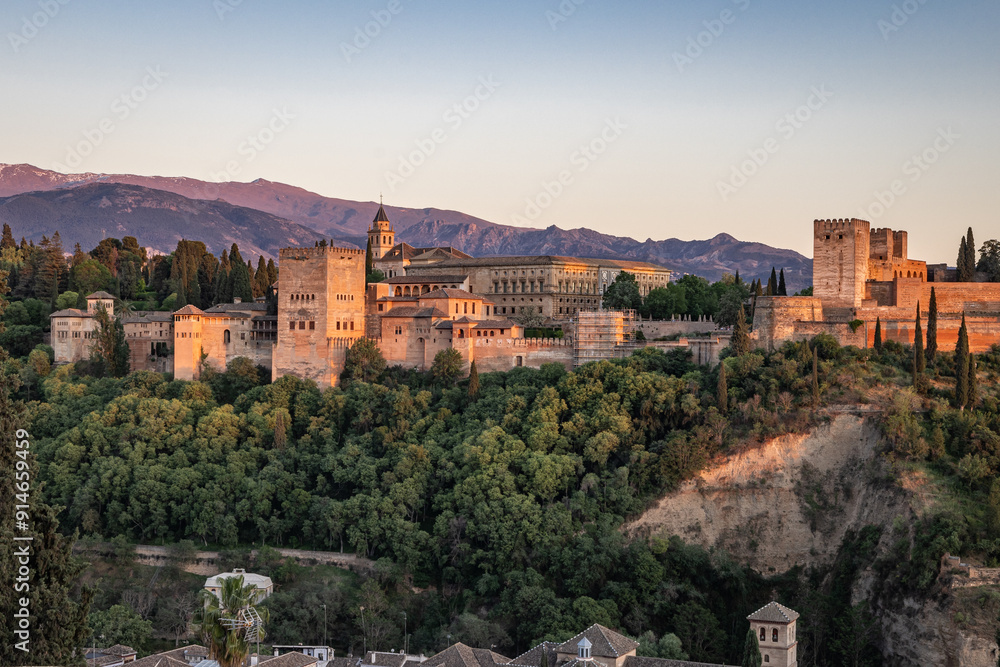 Sunset view of the Alhambra in Granada. Sunset view of the Alhambra in Granada.