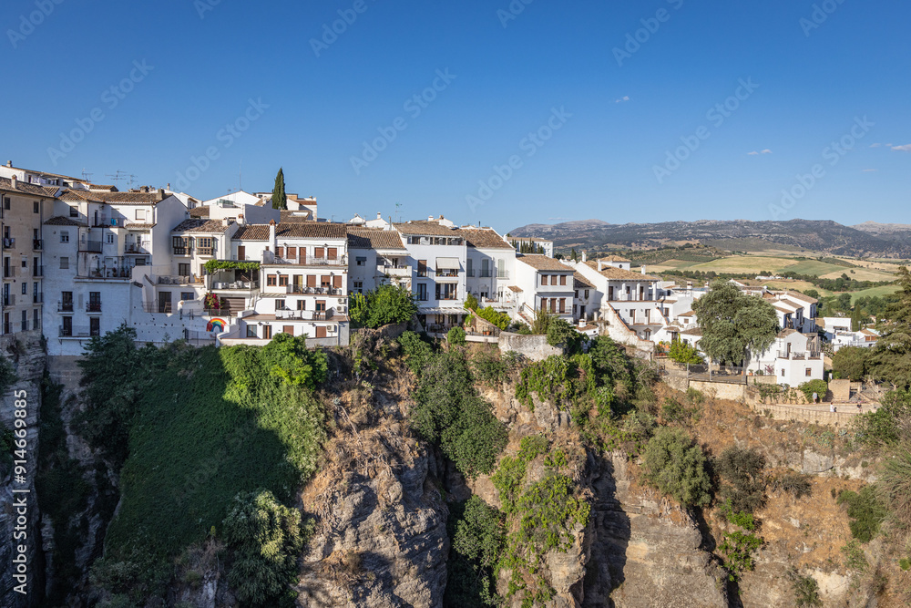 Buildings on a cliff in the village of Ronda. Buildings on a cliff in the village of Ronda.