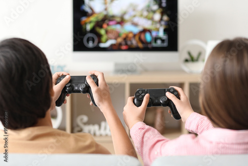 Little children playing vid...