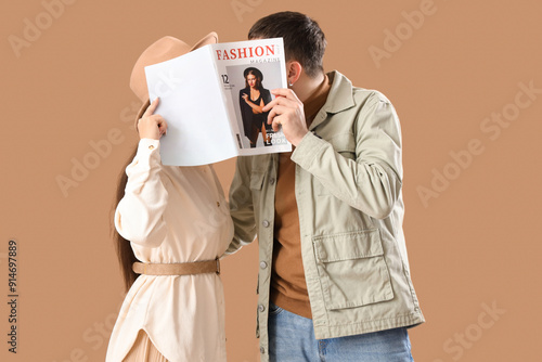 Young couple kissing and ho...