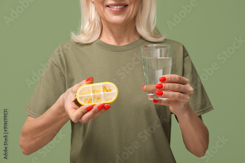 Mature woman with container...