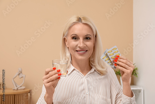 Mature woman with fish oil ...