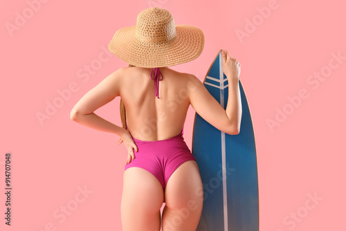 Young woman in hat and swim...