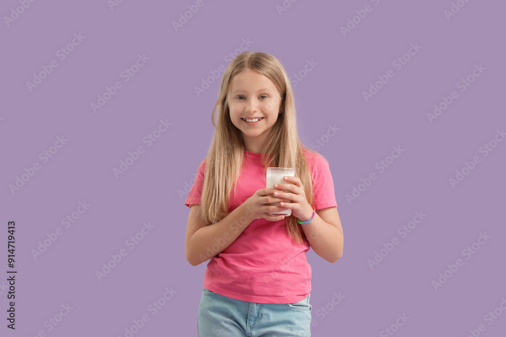 Little girl with glass of milk on lilac background Little girl with glass of milk on lilac background