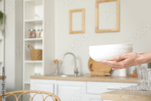 Female hands holding set of...