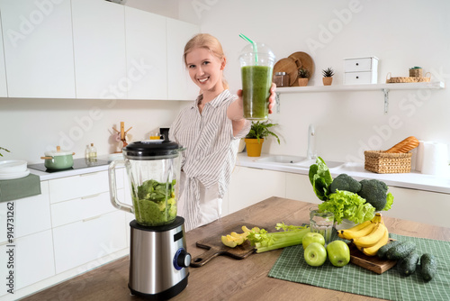 Happy young woman with blen...