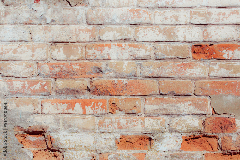 White old grungy brick wall. Fragment of a wall with bumps and peeling paint. Restoration of semi-antique brick walls. A basic neutral background for a design project. White old grungy brick wall. Fragment of a wall with bumps and peeling paint. Restoration of semi-antique brick walls. A basic neutral background for a design project.