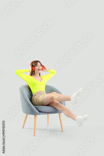 Young woman with headphones...