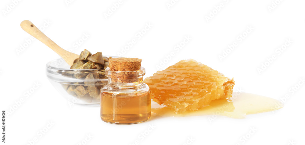 Natural honey tincture, propolis granules and sweet honeycomb isolated on white Natural honey tincture, propolis granules and sweet honeycomb isolated on white