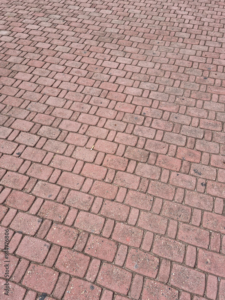 This is a road paved with red blocks. This is a road paved with red blocks.