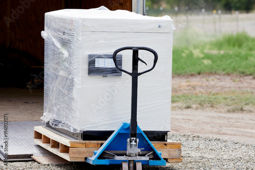New home back up generator being unloaded