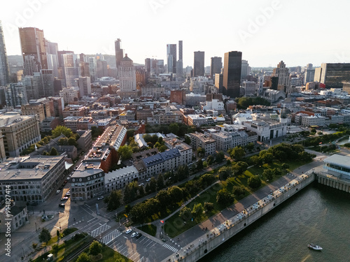 Obraz na plátně Montreal at sunset with urban skyscrapers viewed from old port