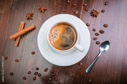 cup of coffee on wooden table