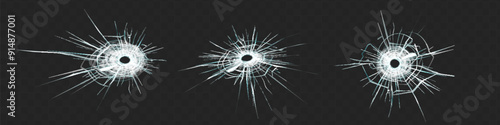 Broken glass triple bullet holes in glass isolated on black