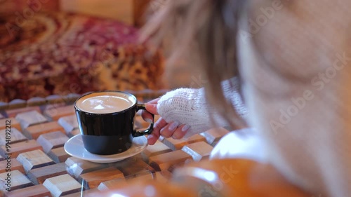 Cozy Fireplace Ambiance with a Cup of Coffee photo