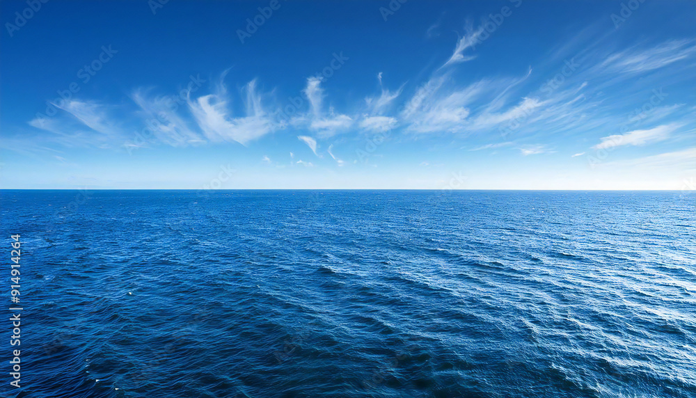 Fototapeta premium 広い海。大海原。水平線と青空。The vast sea. The ocean. The horizon and the blue sky.