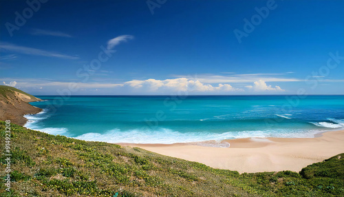 広い海と砂浜。青空。The wide sea and the sandy beach. Blue sky.