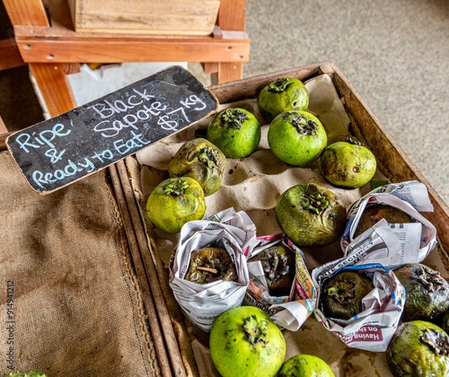 Black Sapote fruit for sale at a market in Queensland, Australia