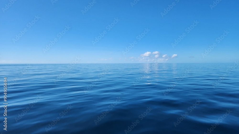 Fototapeta premium ocean with clouds in the distance