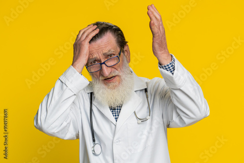 Fotografie Elderly doctor cardiologist old man feeling hopelessness and loneliness, nervous breakdown, loses, bad fortune loss unlucky news, fail