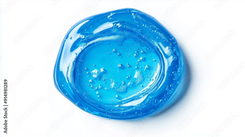 Bright blue gel with bubbles displayed on a white surface in soft lighting Bright blue gel with bubbles displayed on a white surface in soft lighting